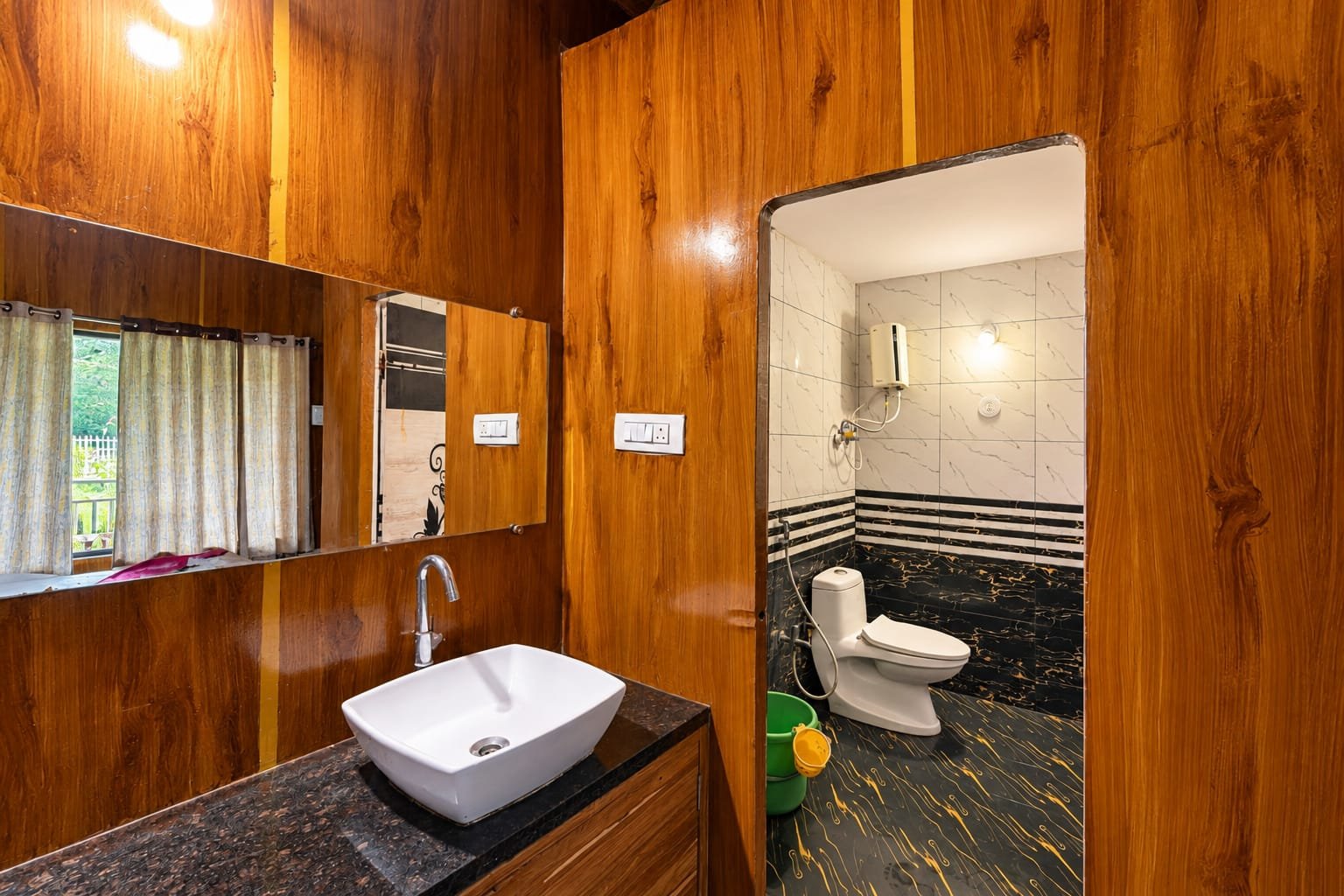 Eco Green Dandeli night exterior and pool